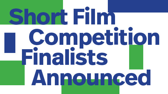 The text reads: "Finalists of the short film competition are announced," with four green and two navy blue squares of different sizes placed on a white background, accompanied by navy blue letters.